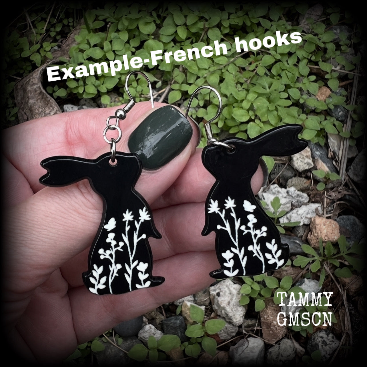 Featuring a black rabbit silhouette looking skyward with white floral sprig, these earrings are nice and lightweight, weighing only a few grams each and measure approx 6 from tip to tip. This pair has made on stainless steel french hooks.