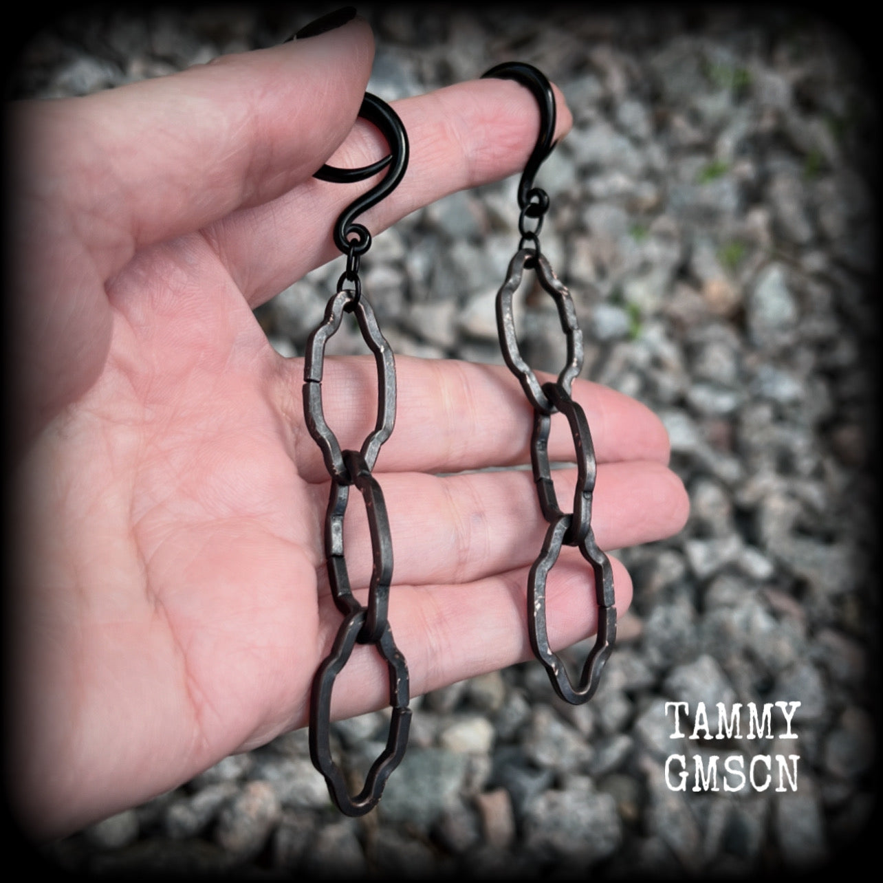 These gorgeous gothic ear hangers feature beautiful rustic antique bronze florentine style chain links, measuring approx 11cms from tip to tip, and weighing approx 10 grams each.

This pair has been made on 6 gauge (4mm) surgical steel full curls, to be worn in stretched lobes.