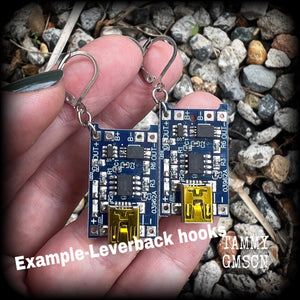 These awesome cyberpunk circuit board earrings measure just under 5 cms from tip to tip, and weigh only a few grams each, these are lovely and lightweight and not too dangly.
This pair has been made with leverback hooks