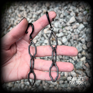 These gorgeous gothic ear hangers feature beautiful rustic antique bronze florentine style chain links, measuring approx 11cms from tip to tip, and weighing approx 10 grams each.

This pair has been made on 6 gauge (4mm) surgical steel full curls, to be worn in stretched lobes.