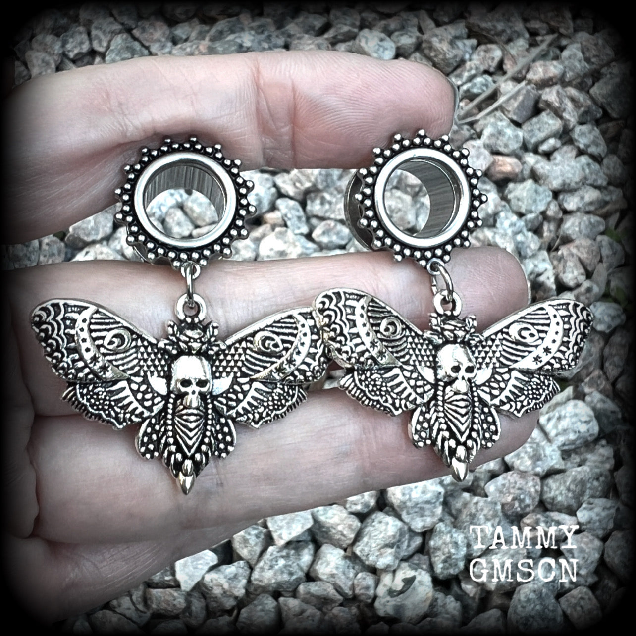 These gorgeous tunnel dangles feature antique silver deathshead moth charms, are not too heavy, weighing in at 9 grams each and measure just over 4.5cms from tip to tip.

This pair have been made with 1/2” gauge (12mm) surgical steel screw fit ornate tunnels.