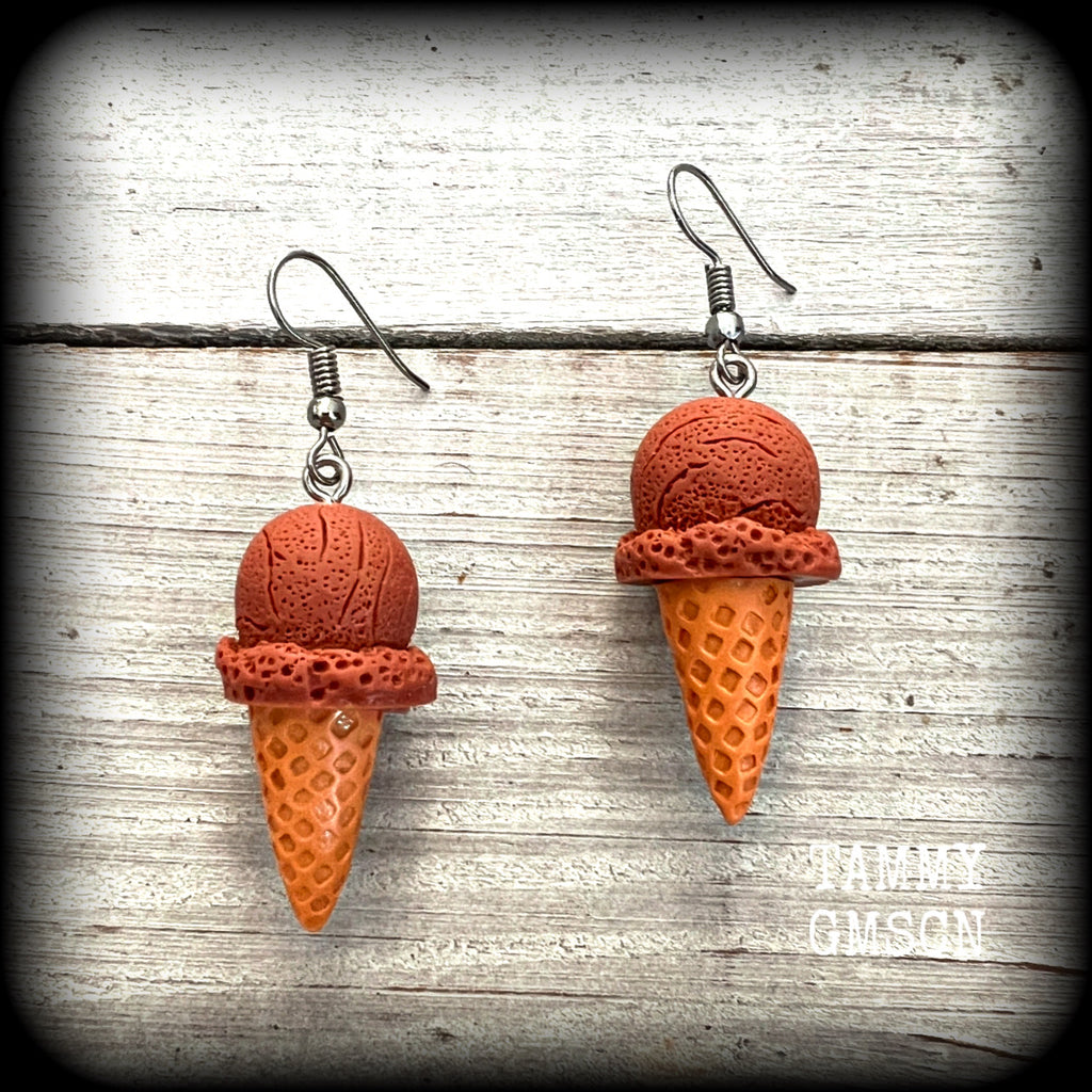 This pair of classic waffle cone ice cream earrings measures just under 6 cms from tip to tip, and weigh approx 5 grams a piece (not too heavy).

This pair have been made with stainless steel french hooks, for pierced ears.