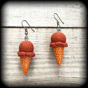This pair of classic waffle cone ice cream earrings measures just under 6 cms from tip to tip, and weigh approx 5 grams a piece (not too heavy).

This pair have been made with stainless steel french hooks, for pierced ears.