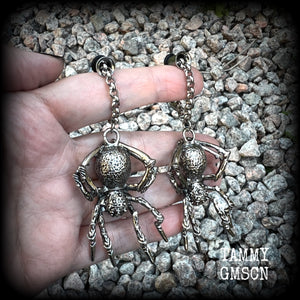 These big beautiful antique silver spider tunnel dangles are not too heavy and nice and dangly, weighing approx 18 grams each, and measuring just on 9cms from tip to tip.

🕷️ PLEASE NOTE-This particular chain will not filter through tunnels smaller than 2 gauge (6mm), though I have lots of different chains that will. Get in touch and we can pick something just for you x

💥This listing includes one pair of surgical steel single flared O-ring earlets.