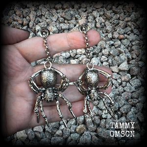 These big beautiful antique silver spider tunnel dangles are not too heavy and nice and dangly, weighing approx 18 grams each, and measuring just on 9cms from tip to tip.

🕷️ PLEASE NOTE-This particular chain will not filter through tunnels smaller than 2 gauge (6mm), though I have lots of different chains that will. Get in touch and we can pick something just for you x

💥This listing includes one pair of surgical steel single flared O-ring earlets.