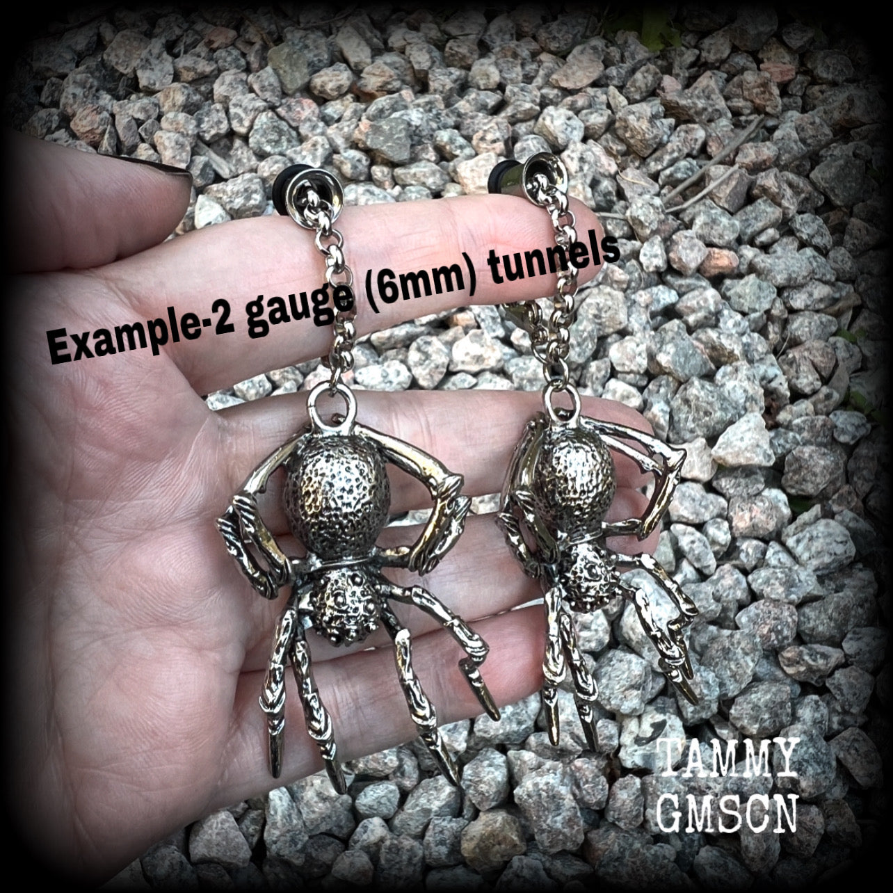 These big beautiful antique silver spider tunnel dangles are not too heavy and nice and dangly, weighing approx 18 grams each, and measuring just on 9cms from tip to tip.

🕷️ PLEASE NOTE-This particular chain will not filter through tunnels smaller than 2 gauge (6mm), though I have lots of different chains that will. Get in touch and we can pick something just for you x

💥This listing includes one pair of surgical steel single flared O-ring earlets.