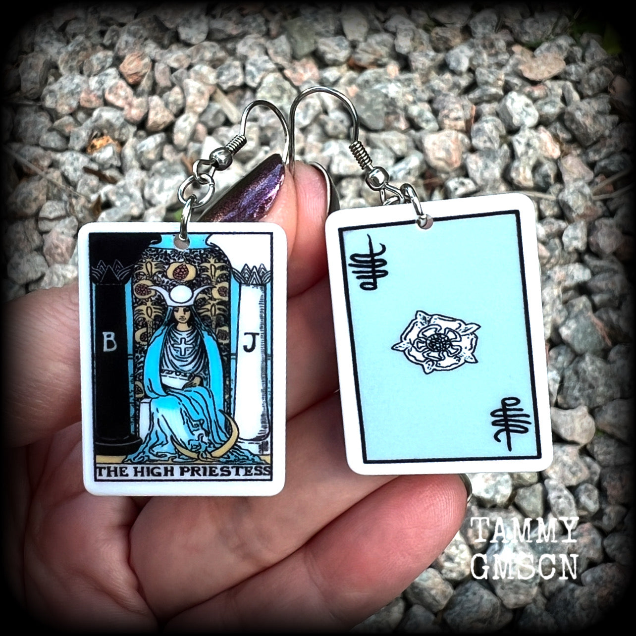 These classic Major Arcana earrings feature lightweight acrylic 'High Priestess' and ‘Empress’ tarot card charms, measuring just under 6cms from tip to tip and weighing only a gram or two each.

This pair has been made with stainless steel french hooks, suitable for pierced ears.