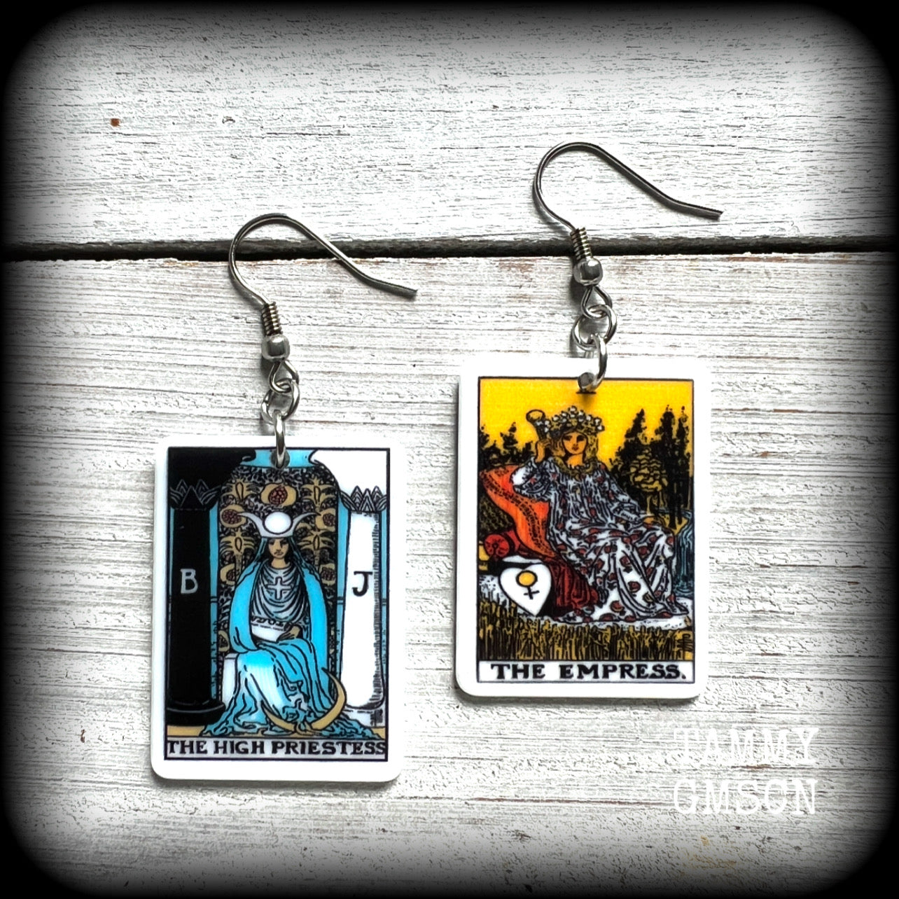 These classic Major Arcana earrings feature lightweight acrylic 'High Priestess' and ‘Empress’ tarot card charms, measuring just under 6cms from tip to tip and weighing only a gram or two each.

This pair has been made with stainless steel french hooks, suitable for pierced ears.