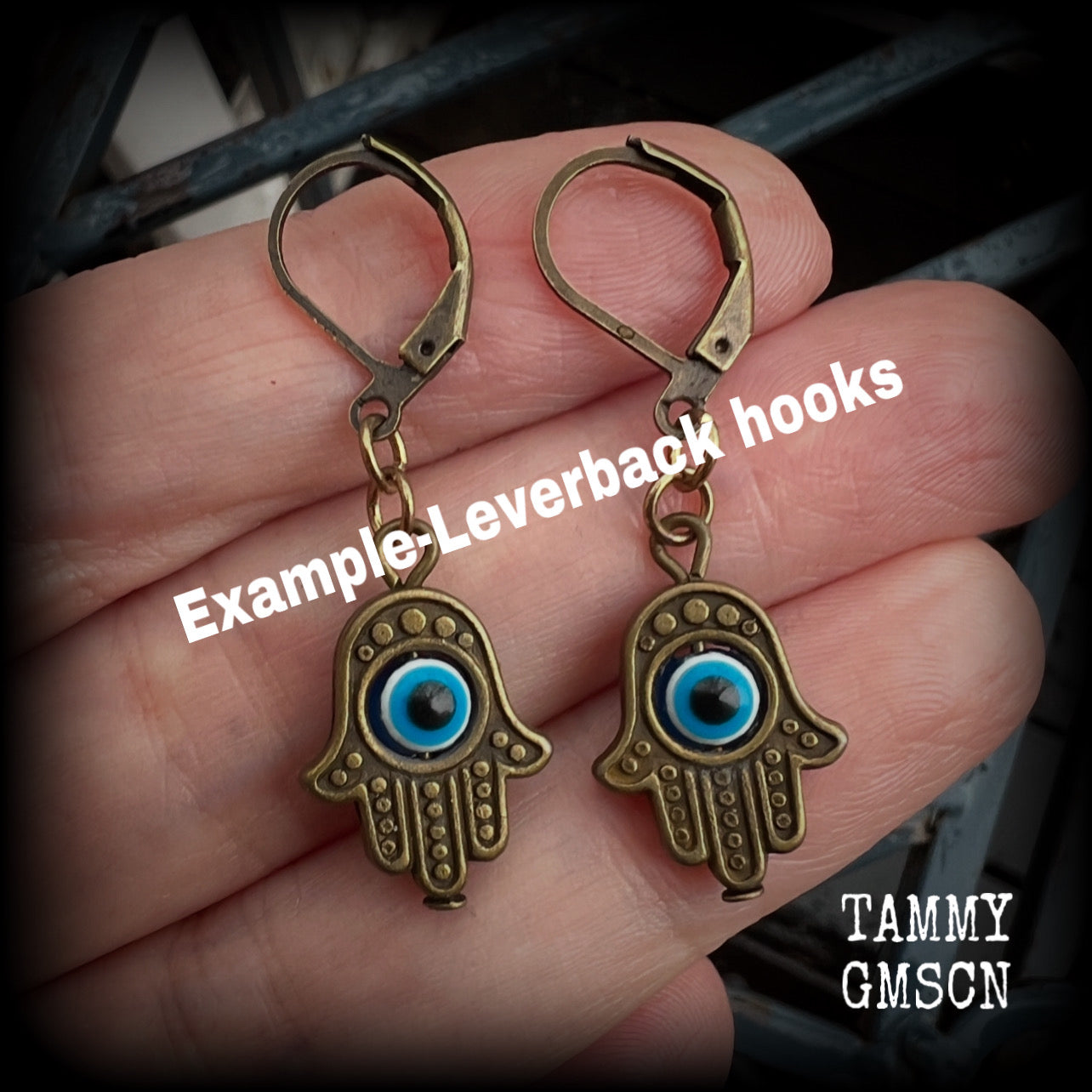 These antique bronze hamsa hand earrings are light weight and nice and dangly, measuring just 4cms from tip to tip, and made on antique bronze leverback hooks to be worn through pierced ears or stretched lobes.