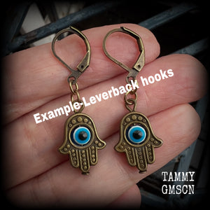 These antique bronze hamsa hand earrings are light weight and nice and dangly, measuring just 4cms from tip to tip, and made on antique bronze leverback hooks to be worn through pierced ears or stretched lobes.