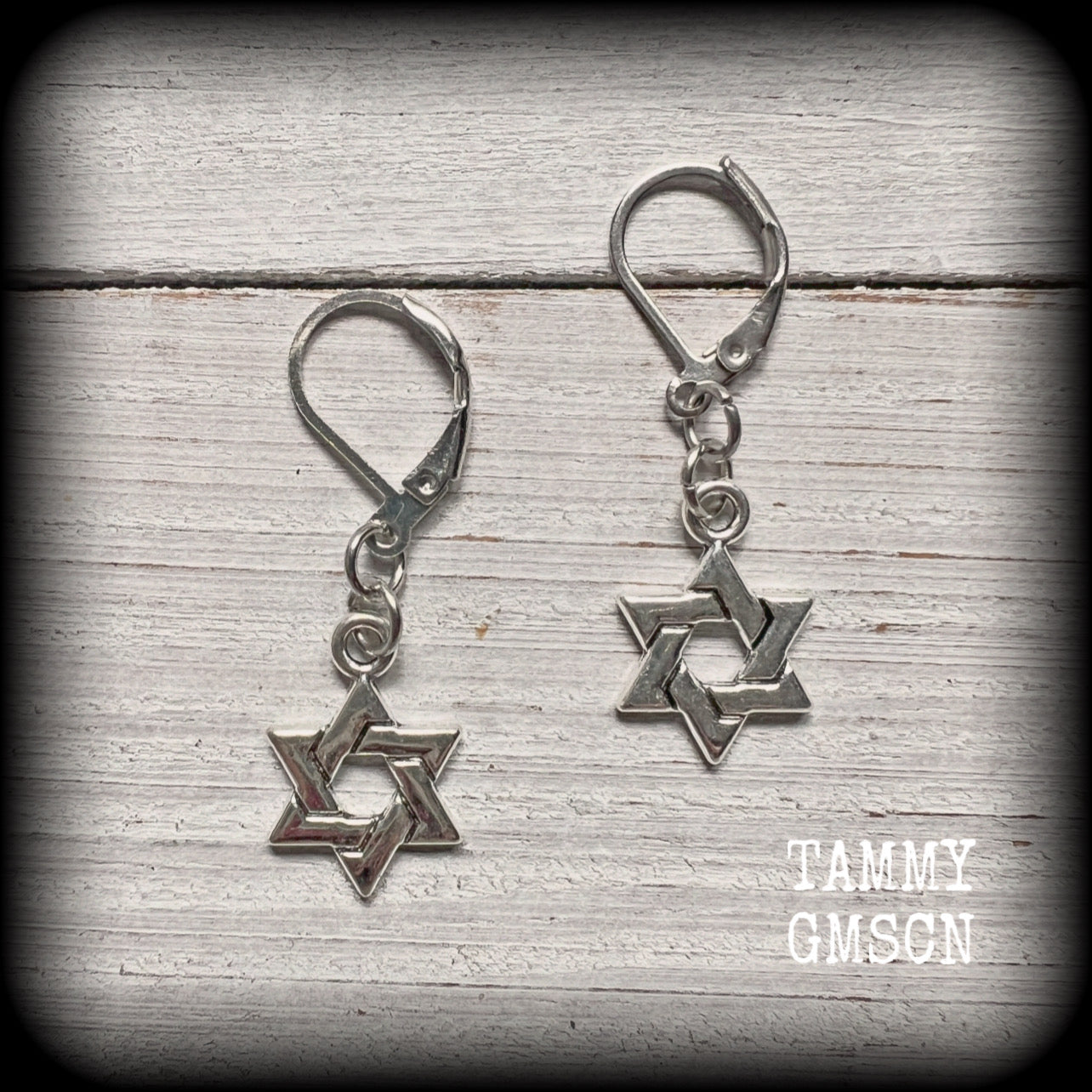 These lovely antique silver Star of David earrings are light weight at only a few grams each, and measure just under 4cms from tip to tip.  This pair has been made with leverback hooks, for pierced ears or stretched lobes.
