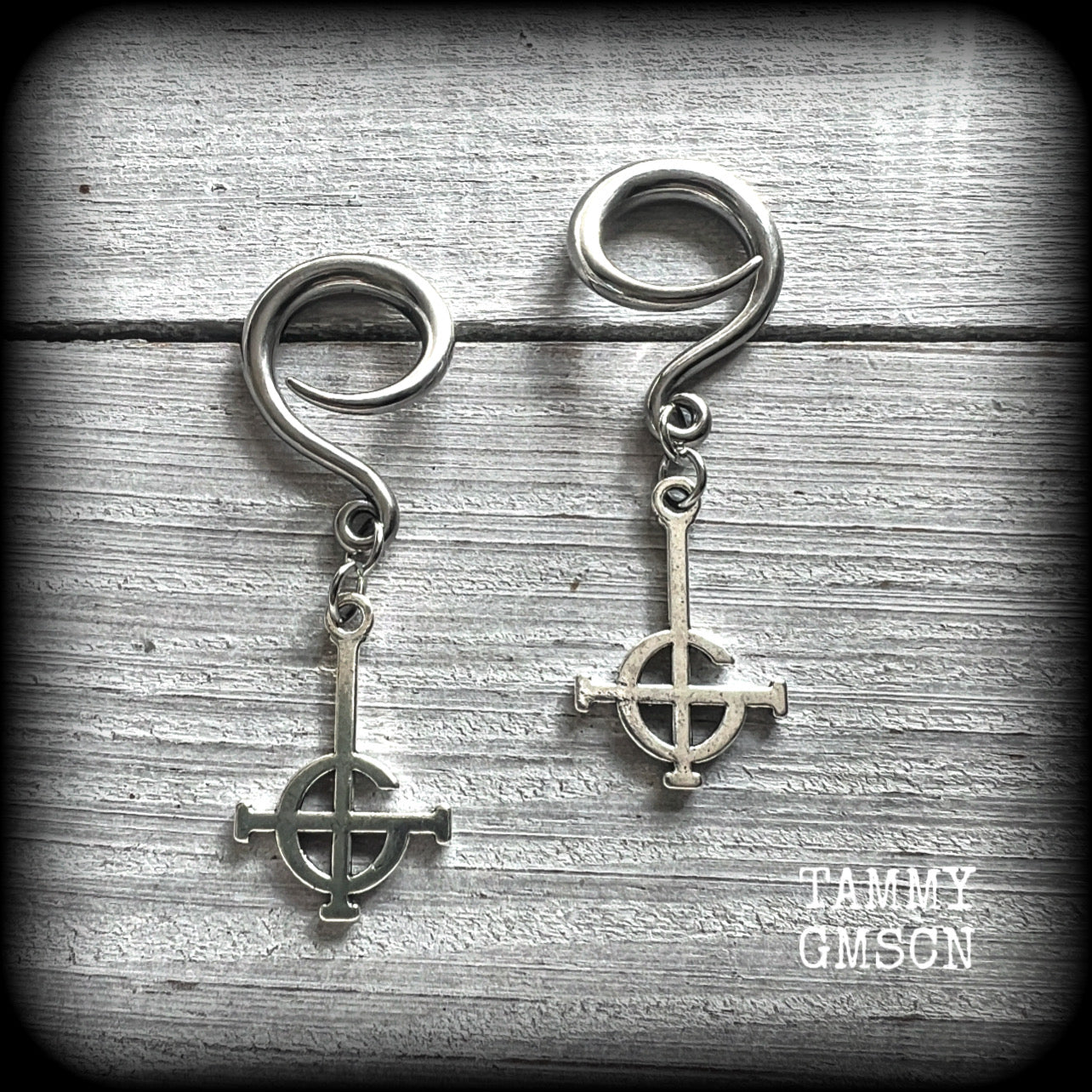 These awesome gauged earrings feature antique silver Ghost Grucifix charms, are nice and lightweight, weighing only 4 grams a piece, and nice and dangly at just on 5.5cms from tip to tip.  This pair has been made on 6 gauge (4mm) surgical steel full curl hooks, suitable for stretched lobes.