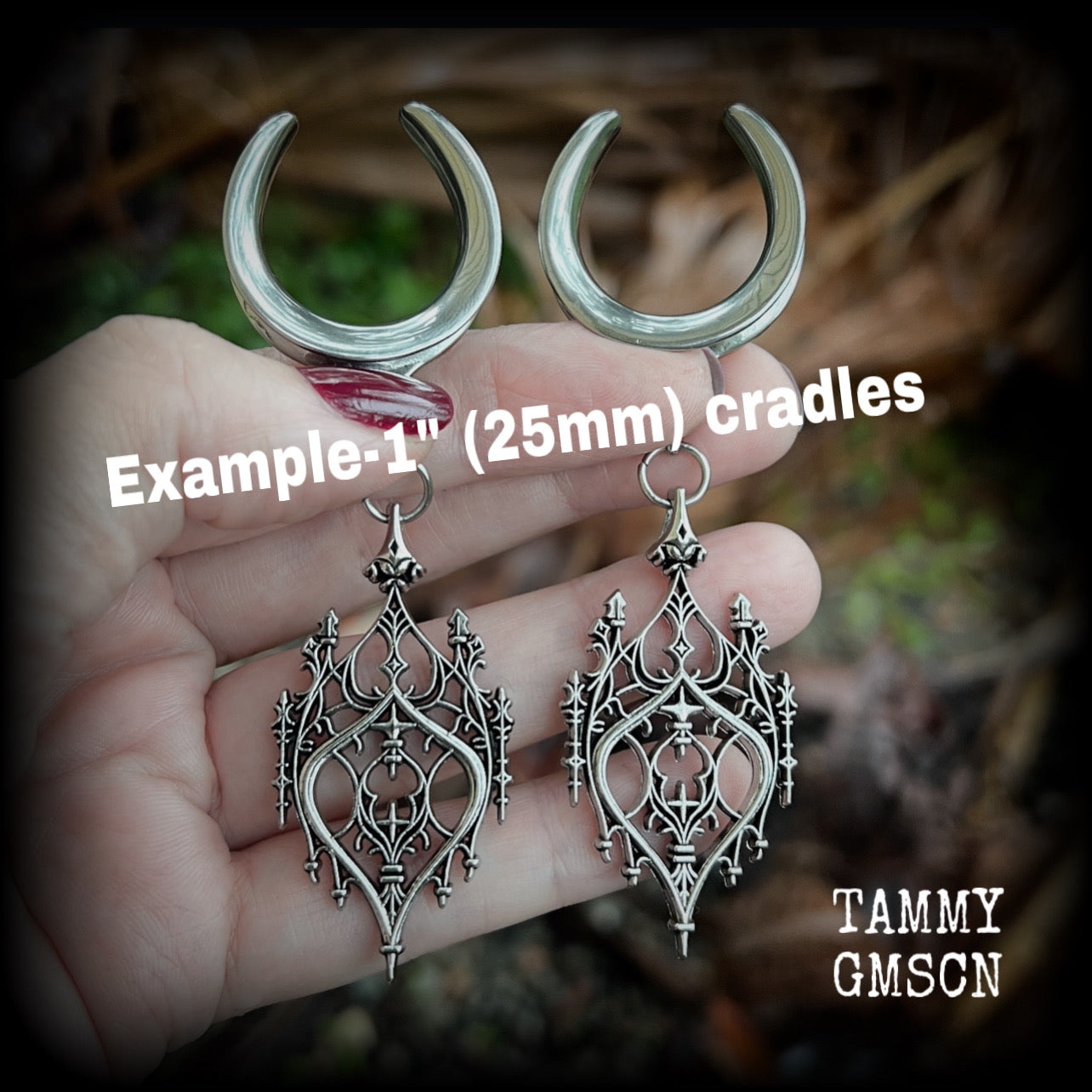 These gorgeous gothic ear hangers feature a beautiful antique silver ornate gothic cathedral chandelier, measuring just on 8cms from tip to tip, and weighing approx 10 grams each. This pair has been made on 1” (25mm) surgical steel cradles.