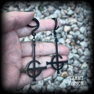 These awesome gauged earrings feature pitch black stainless steel Ghost Grucifix charms, are nice and lightweight, weighing only 6 grams a piece, and nice and dangly at just over 8cms from tip to tip.

This pair has been made on 6 gauge (4mm) surgical steel full curl hooks, suitable for stretched lobes.