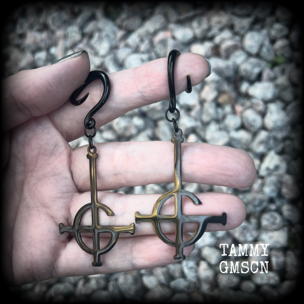 These awesome gauged earrings feature pitch black stainless steel Ghost Grucifix charms, are nice and lightweight, weighing only 6 grams a piece, and nice and dangly at just over 8cms from tip to tip.

This pair has been made on 6 gauge (4mm) surgical steel full curl hooks, suitable for stretched lobes.