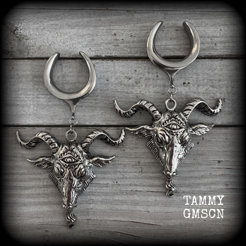 Featuring beautiful big antique silver Baphomet goat pendants, these gauged earrings measure just over 10cms from tip to tip, and weigh approx 28 grams each.

This pair have been made on 1" gauge (25mm) surgical steel cradles hooks, to be worn in stretched lobes.