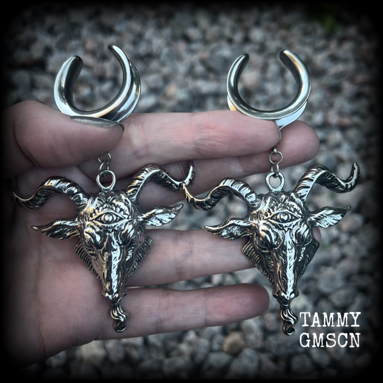 Featuring beautiful big antique silver Baphomet goat pendants, these gauged earrings measure just over 10cms from tip to tip, and weigh approx 28 grams each.

This pair have been made on 1" gauge (25mm) surgical steel cradles hooks, to be worn in stretched lobes.