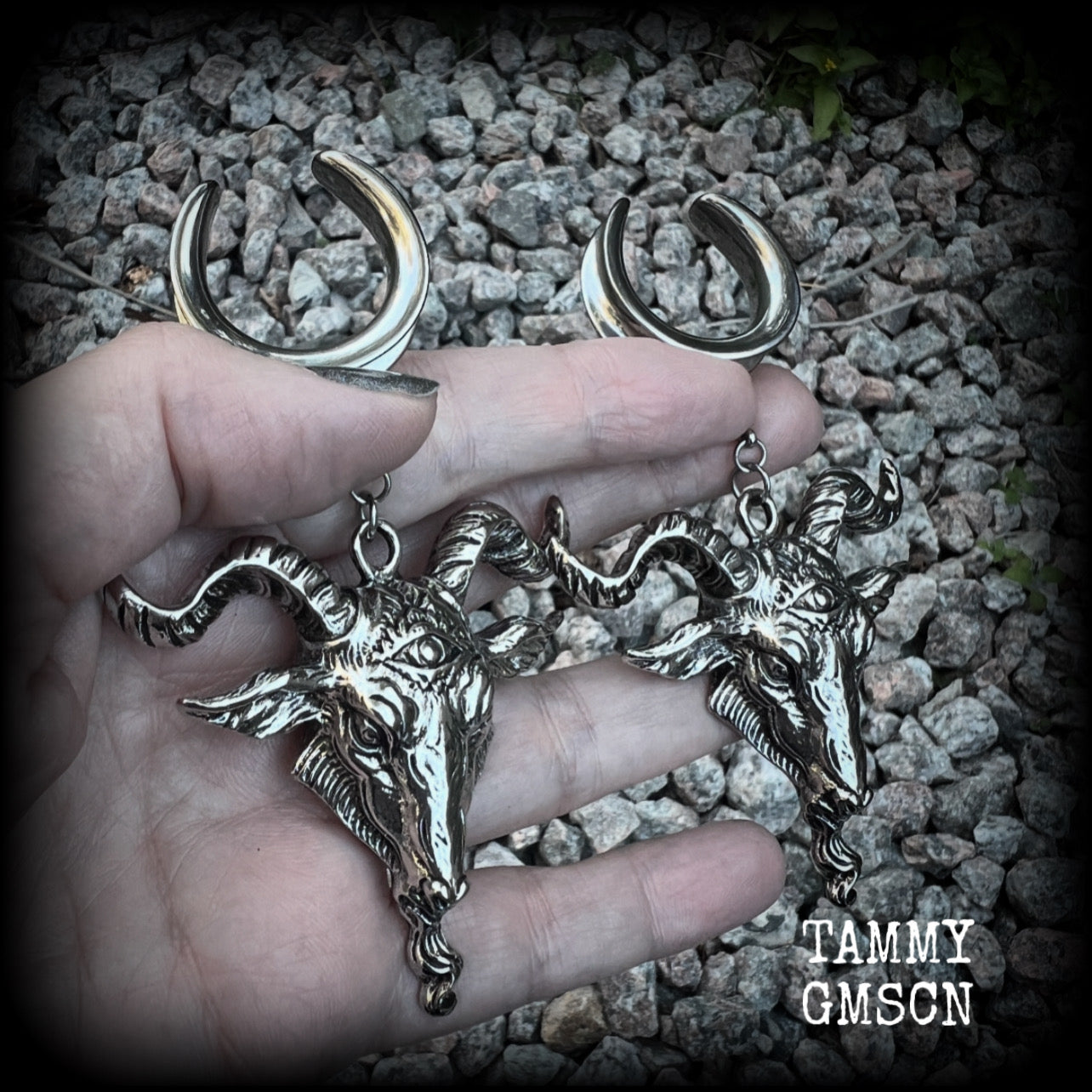 Featuring beautiful big antique silver Baphomet goat pendants, these gauged earrings measure just over 10cms from tip to tip, and weigh approx 28 grams each.

This pair have been made on 1" gauge (25mm) surgical steel cradles hooks, to be worn in stretched lobes.