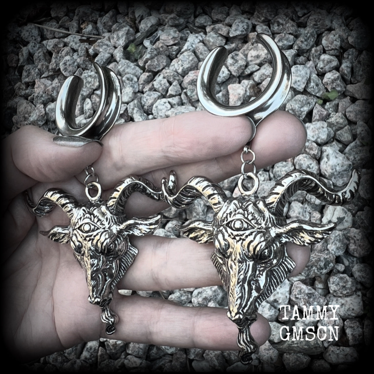 Featuring beautiful big antique silver Baphomet goat pendants, these gauged earrings measure just over 10cms from tip to tip, and weigh approx 28 grams each.

This pair have been made on 1" gauge (25mm) surgical steel cradles hooks, to be worn in stretched lobes.