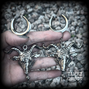 Featuring beautiful big antique silver Baphomet goat pendants, these gauged earrings measure just over 10cms from tip to tip, and weigh approx 28 grams each.

This pair have been made on 1" gauge (25mm) surgical steel cradles hooks, to be worn in stretched lobes.