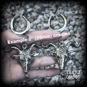 Featuring beautiful big antique silver Baphomet goat pendants, these gauged earrings measure just over 10cms from tip to tip, and weigh approx 28 grams each.

This pair have been made on 1" gauge (25mm) surgical steel cradles hooks, to be worn in stretched lobes.