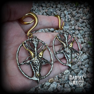 These gorgeous antique silver and gold Baphomet gauged earrings and are nice and dangly and nice and big, measuring 8cms from tip to tip, but not too heavy at only 16 grams each.

This pair has been made on 2 gauge (6mm) surgical steel full curl hooks, to be worn in stretched lobes..