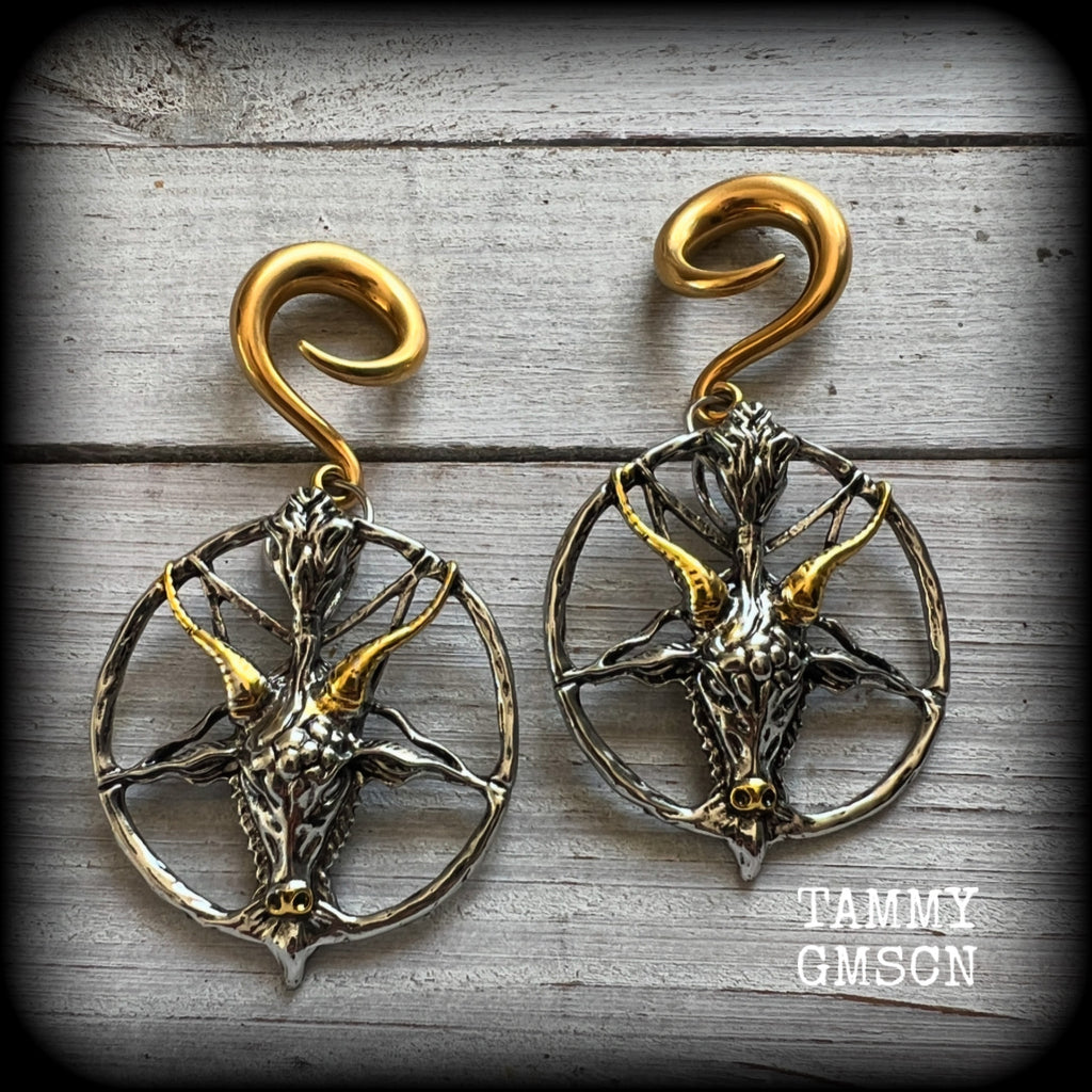 These gorgeous antique silver and gold Baphomet gauged earrings and are nice and dangly and nice and big, measuring 8cms from tip to tip, but not too heavy at only 16 grams each.

This pair has been made on 2 gauge (6mm) surgical steel full curl hooks, to be worn in stretched lobes..