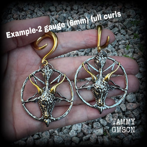 These gorgeous antique silver and gold Baphomet gauged earrings and are nice and dangly and nice and big, measuring 8cms from tip to tip, but not too heavy at only 16 grams each.

This pair has been made on 2 gauge (6mm) surgical steel full curl hooks, to be worn in stretched lobes..