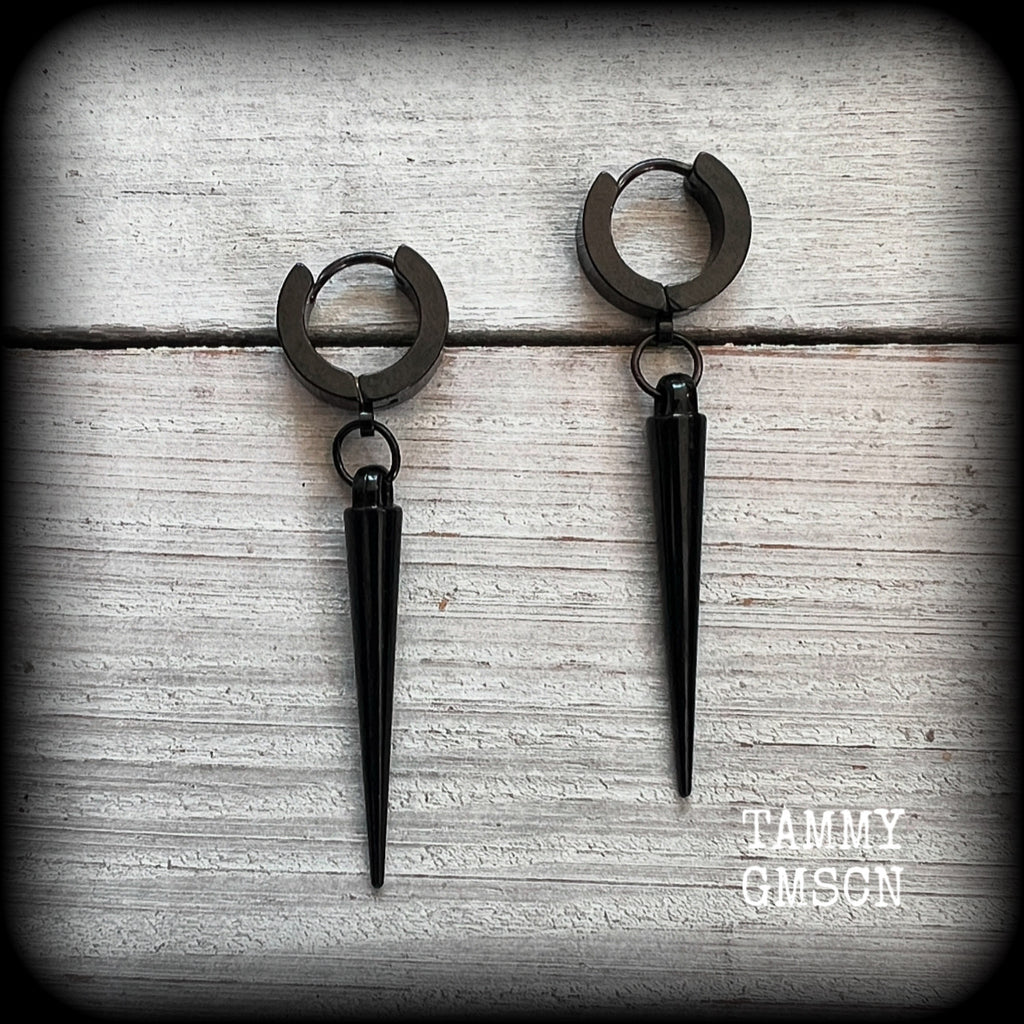 These awesome black acrylic spike earrings are nice and dangly, measuring just over 5 cms from tip to tip and weighing only a few grams each, super light weight.

This pair has been made with stainless steel huggies, to be worn in pierced ears.