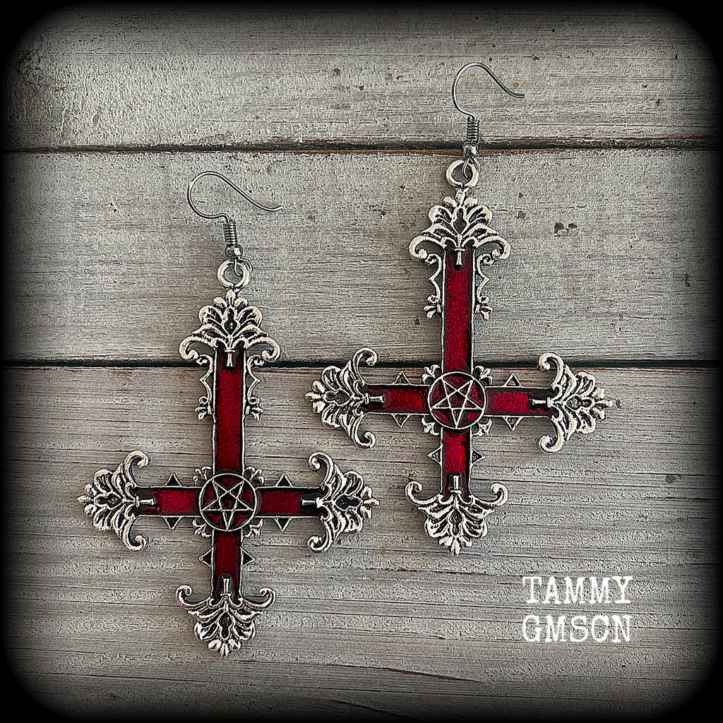 These gorgeous gothic earrings feature a red enamel inverted cross with a silver inverted pentagram, measuring just on 8.5 cms from tip to tip,  and weigh approx 10 grams a piece.

This pair have been made on stainless steel french hooks, suitable for pierced ears.