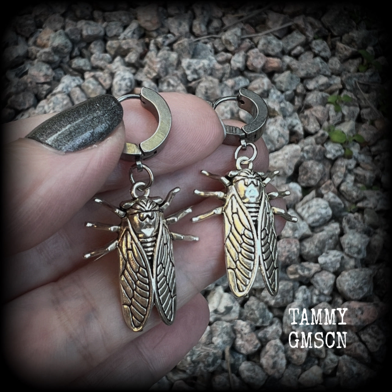 These awesome antique silver cicada earrings are nice and lightweight at 3 grams each, and measure in at approx 4.5cms from tip to tip. This pair have been made on stainless steel huggie ear cuffs, suitable for pierced ears.