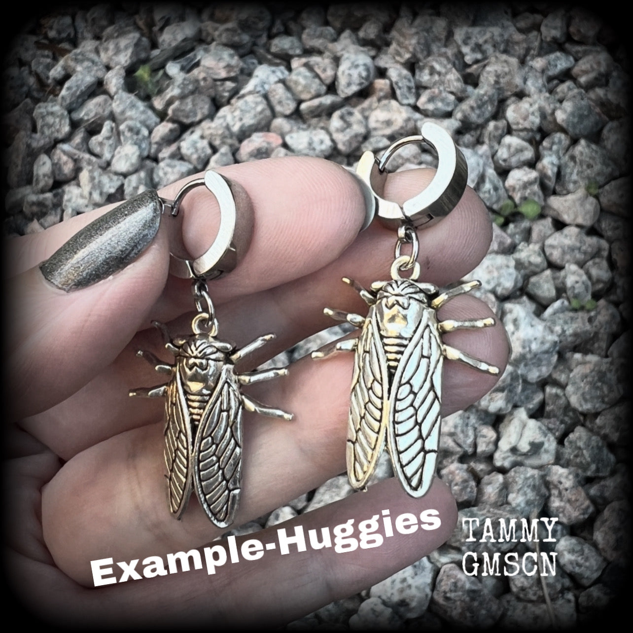These awesome antique silver cicada earrings are nice and lightweight at 3 grams each, and measure in at approx 4.5cms from tip to tip. This pair have been made on stainless steel huggie ear cuffs, suitable for pierced ears.