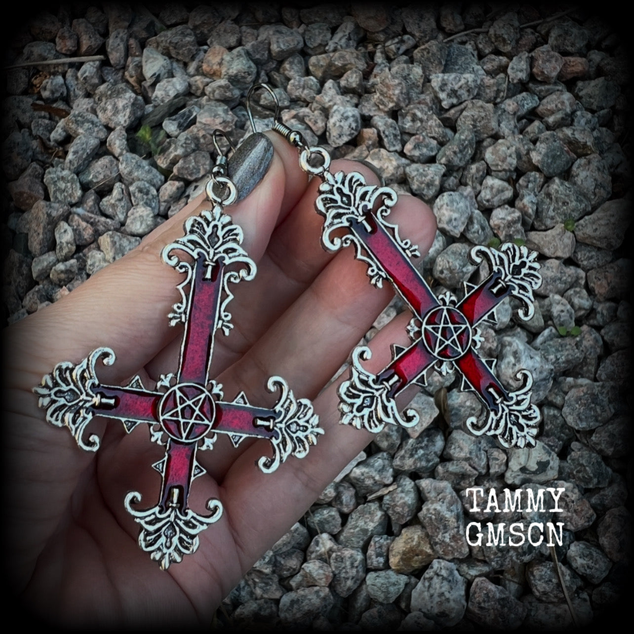 These gorgeous gothic earrings feature a red enamel inverted cross with a silver inverted pentagram, measuring just on 8.5 cms from tip to tip,  and weigh approx 10 grams a piece.  This pair have been made on stainless steel french hooks, suitable for pierced ears.