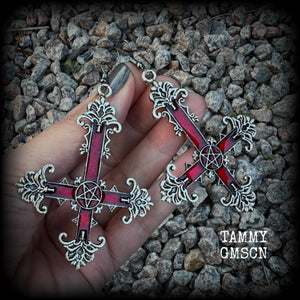 These gorgeous gothic earrings feature a red enamel inverted cross with a silver inverted pentagram, measuring just on 8.5 cms from tip to tip,  and weigh approx 10 grams a piece.  This pair have been made on stainless steel french hooks, suitable for pierced ears.