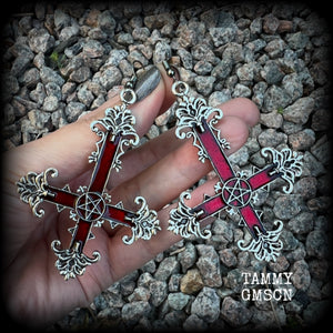 These gorgeous gothic earrings feature a red enamel inverted cross with a silver inverted pentagram, measuring just on 8.5 cms from tip to tip,  and weigh approx 10 grams a piece.  This pair have been made on stainless steel french hooks, suitable for pierced ears.