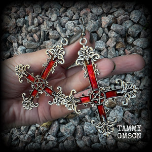These gorgeous gothic earrings feature a red enamel inverted cross with a silver inverted pentagram, measuring just on 8.5 cms from tip to tip,  and weigh approx 10 grams a piece.  This pair have been made on stainless steel french hooks, suitable for pierced ears.