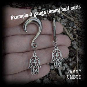 These earrings have been made on 0gauge (8mm) surgical steel half curl hooks, to be worn in stretched lobes.