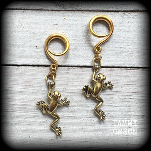 These awesome gauged earrings feature gorgeous antique bronze tree frogs, are nice and dangly, measuring just over 7cms from tip to tip, and weighing approx 5 grams each.

This pair has been made on 6 gauge (4mm) surgical steel full curl hooks, to be worn in stretched lobes.