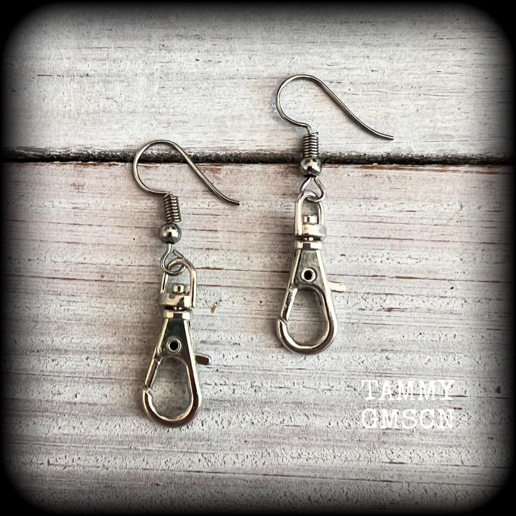 These awesome punk rock swivel clasp earrings are nice and lightweight at only a gram or two each, and measure in at just over 4cms from tip to tip.
This is a functional pair of swivel clasps so you can add extra charms to these if you want them extra dangly.

This pair have been made on stainless steel french hooks, suitable for pierced ears.