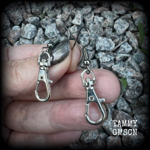 These awesome punk rock swivel clasp earrings are nice and lightweight at only a gram or two each, and measure in at just over 4cms from tip to tip.
This is a functional pair of swivel clasps so you can add extra charms to these if you want them extra dangly.

This pair have been made on stainless steel french hooks, suitable for pierced ears.