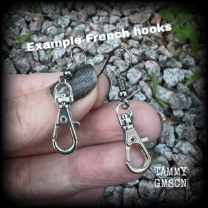 These awesome punk rock swivel clasp earrings are nice and lightweight at only a gram or two each, and measure in at just over 4cms from tip to tip.
This is a functional pair of swivel clasps so you can add extra charms to these if you want them extra dangly.

This pair have been made on stainless steel french hooks, suitable for pierced ears.