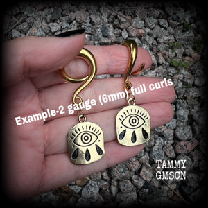 Evil eye tunnel earrings-Evil eye ear gauges