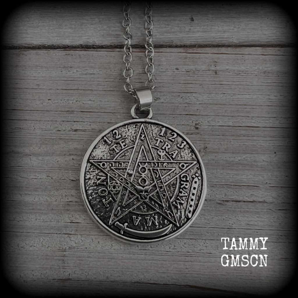 Measuring 16" when laying flat and fastening with an antique silver lobster clasp, this necklace features a two sided tibetan silver Tetragrammaton pendant. 

The pendant on this necklace measures just under 3cms across, and is not too heavy, weighing in at approx 5 grams.