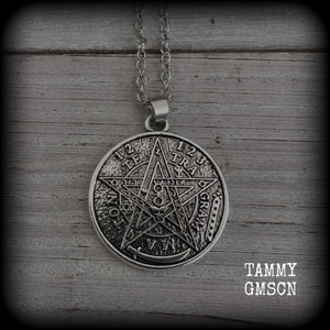 Measuring 16" when laying flat and fastening with an antique silver lobster clasp, this necklace features a two sided tibetan silver Tetragrammaton pendant. 

The pendant on this necklace measures just under 3cms across, and is not too heavy, weighing in at approx 5 grams.