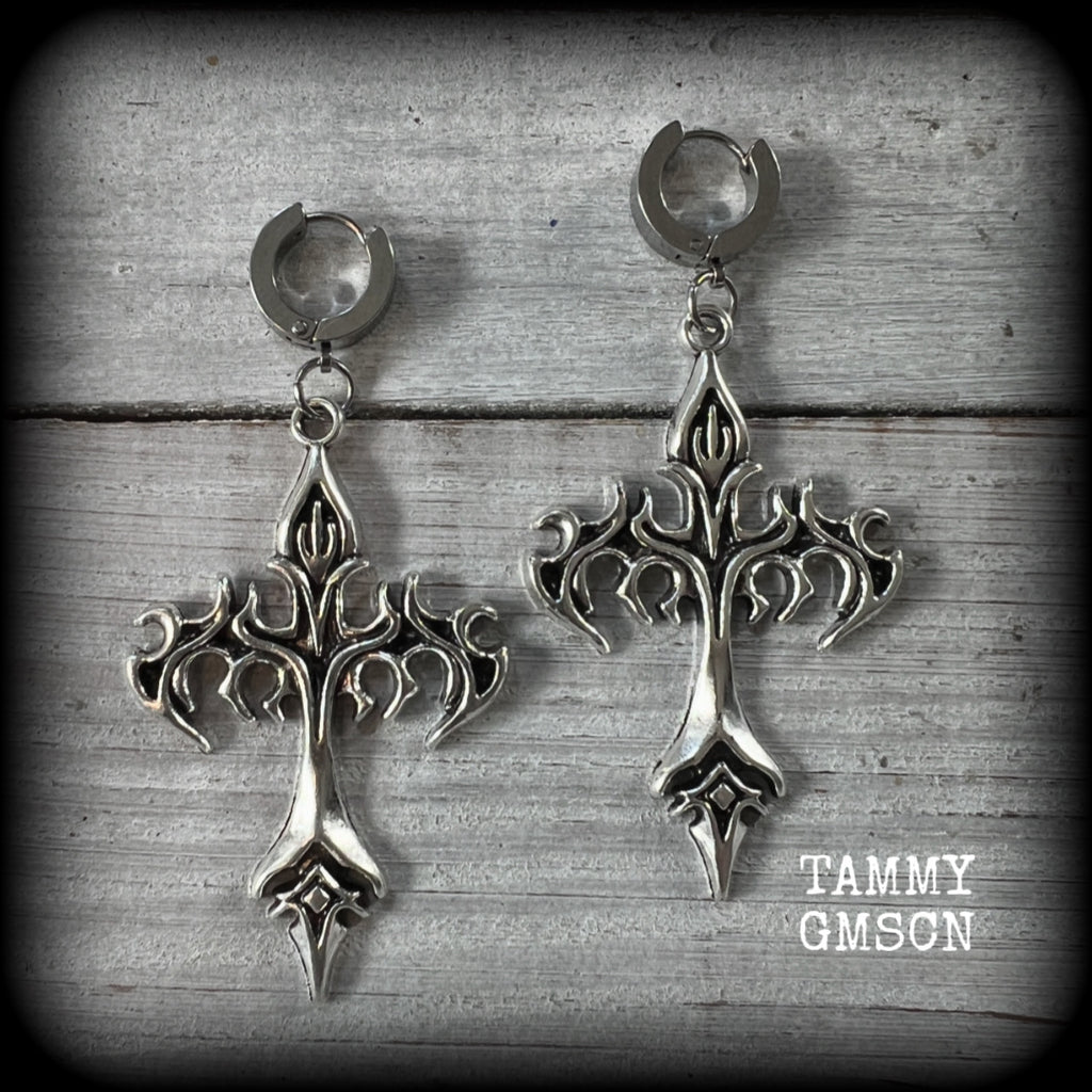 These gorgeous antique silver cyber sigil tattoo inspired cross earrings measure just over 7cms from tip to tip, and are nice and light weight, at 7 grams each.

This pair have been made on stainless steel huggies-suitable for pierced ears.