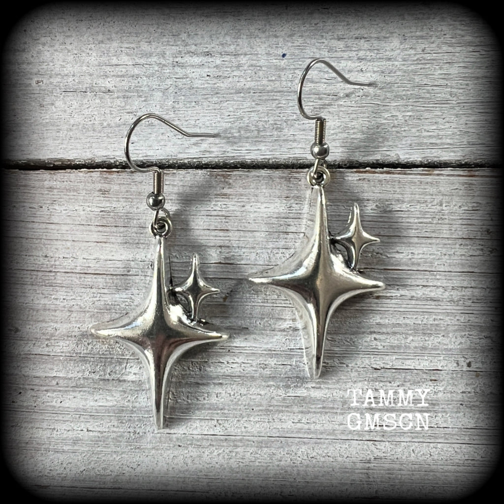 These earrings feature super retro super cute antique silver starbursts. These are light weight, weighing only a few grams each and nice and dangly, measuring just on 5cm from tip to tip.

This pair has been made on stainless steel french hooks, to be worn through pierced ears.