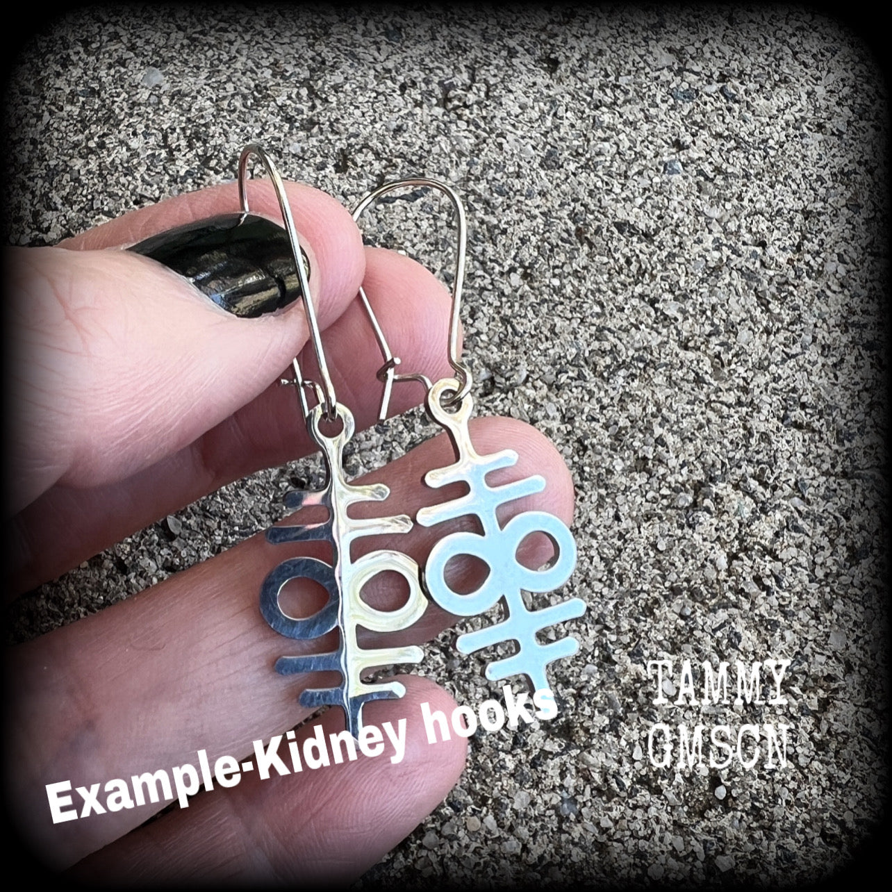These stainless steel double 'Sigil of Sulphur' earrings are nice and petite, measuring just 4.5 cms from tip, weighing only a few grams each.
This pair has been made with kidney hooks