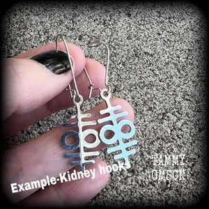 These stainless steel double 'Sigil of Sulphur' earrings are nice and petite, measuring just 4.5 cms from tip, weighing only a few grams each.
This pair has been made with kidney hooks
