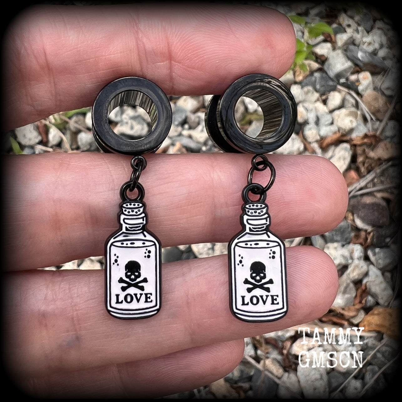 Love potions Love potion bottle Love spell Skull earrings Skull tunnels Tunnel earrings Tunnel dangles Halloween ear gauges Halloween gauged earrings Spell bottle Gothic jewelry Emo jewelry Spooky cute earrings Spooky earrings Cute tunnels Samhain