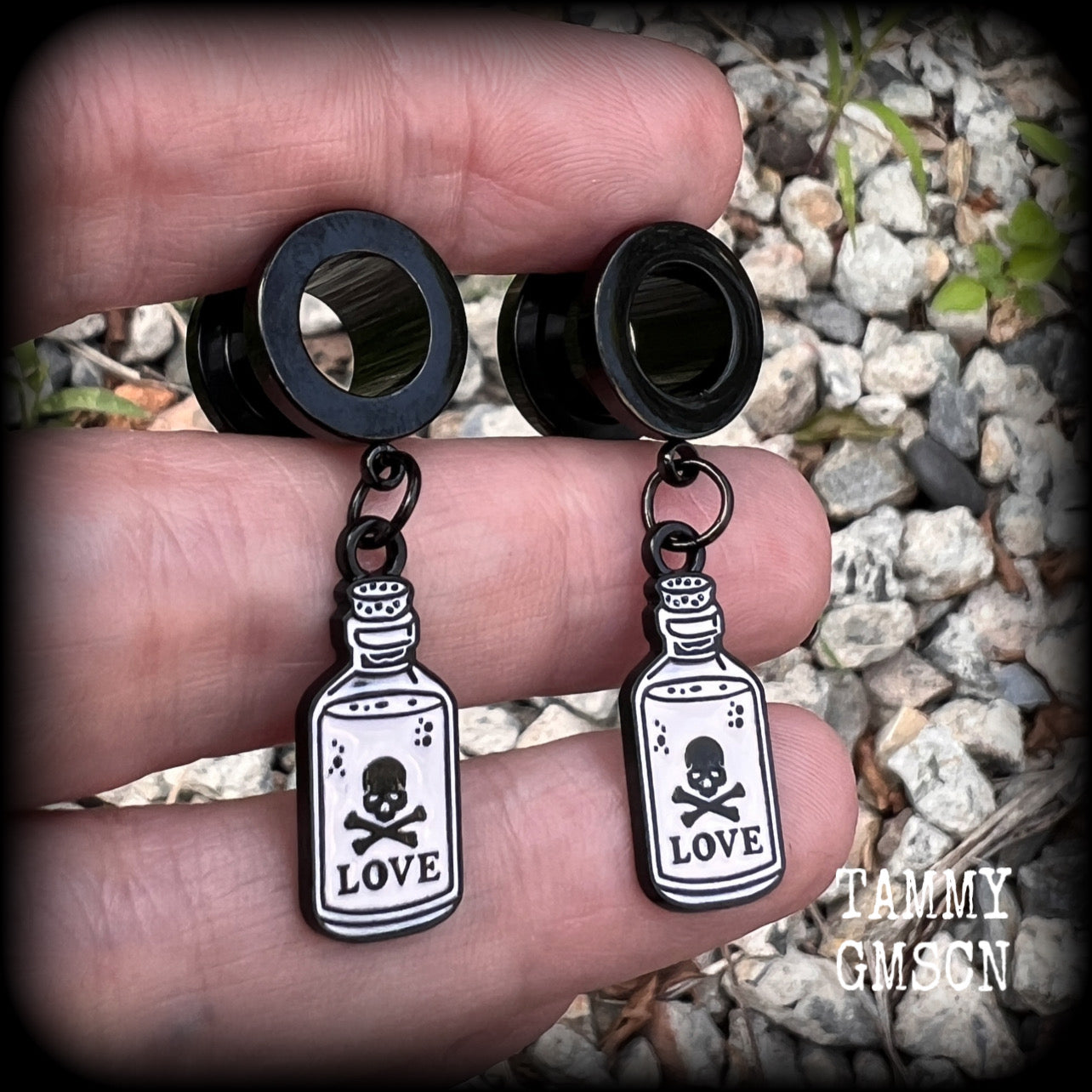 Love potions Love potion bottle Love spell Skull earrings Skull tunnels Tunnel earrings Tunnel dangles Halloween ear gauges Halloween gauged earrings Spell bottle Gothic jewelry Emo jewelry Spooky cute earrings Spooky earrings Cute tunnels Samhain